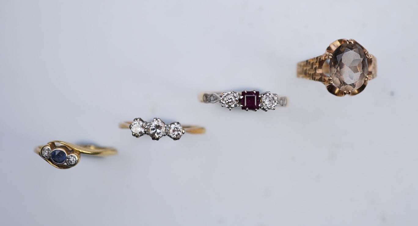 Four gem-set rings
